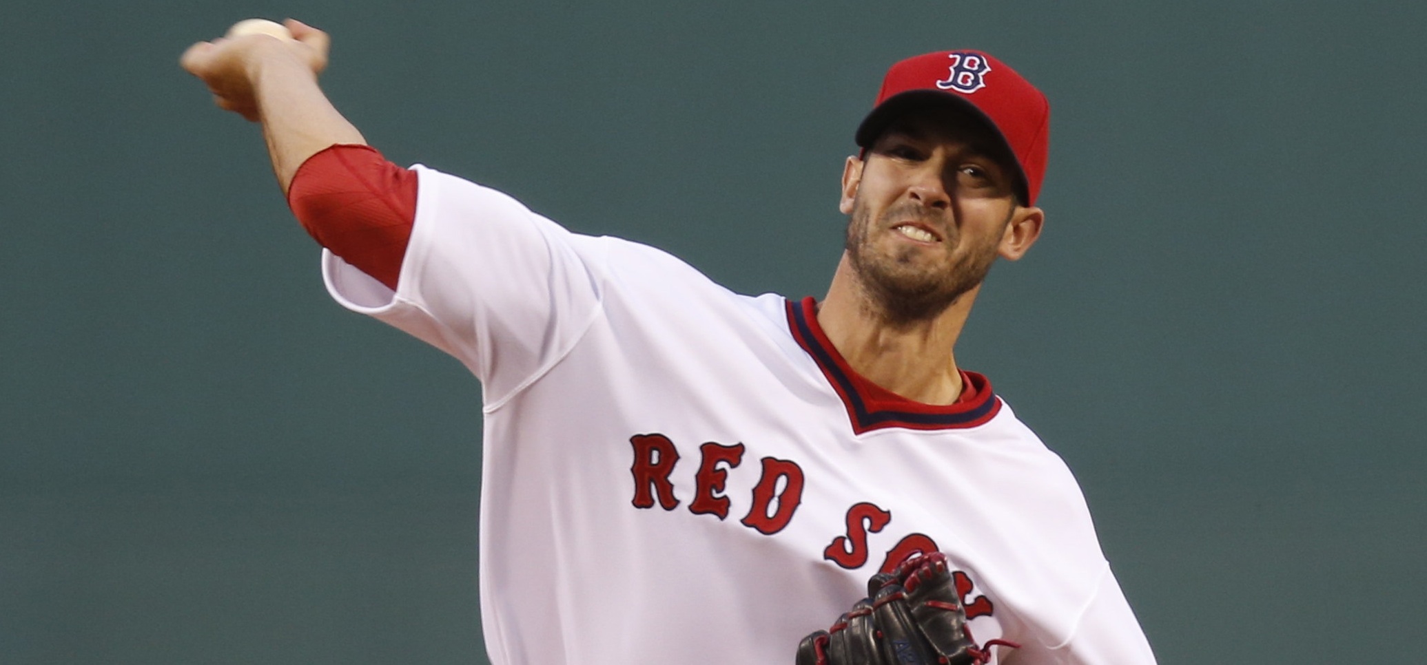 May 5, 2015; Boston, MA, USA; Boston Red Sox pitcher Rick Porcello (22) delivers a pitch during the first inning against the Tampa Bay Rays at Fenway Park. Mandatory Credit: Greg M. Cooper-USA TODAY Sports